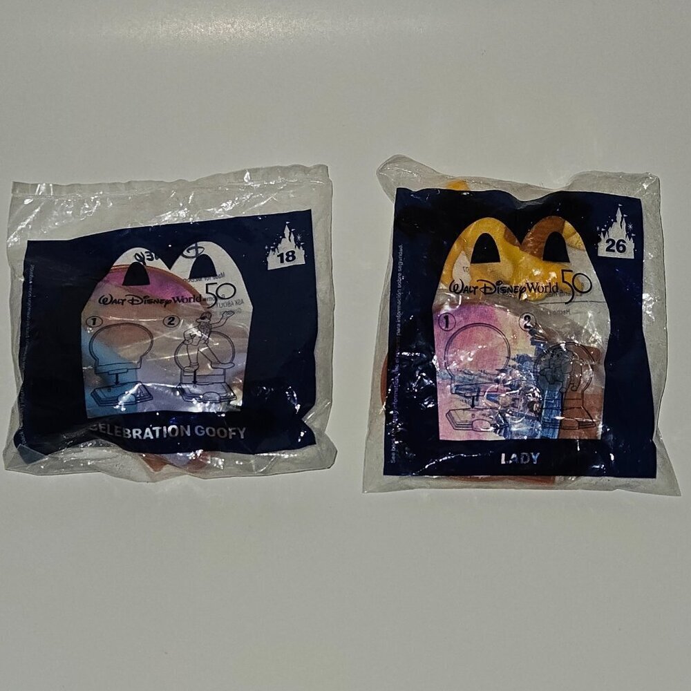 NEW 2 Disney World 50 Toy Lot McDonalds SEALED Celebration Goofy 18 Lady 26